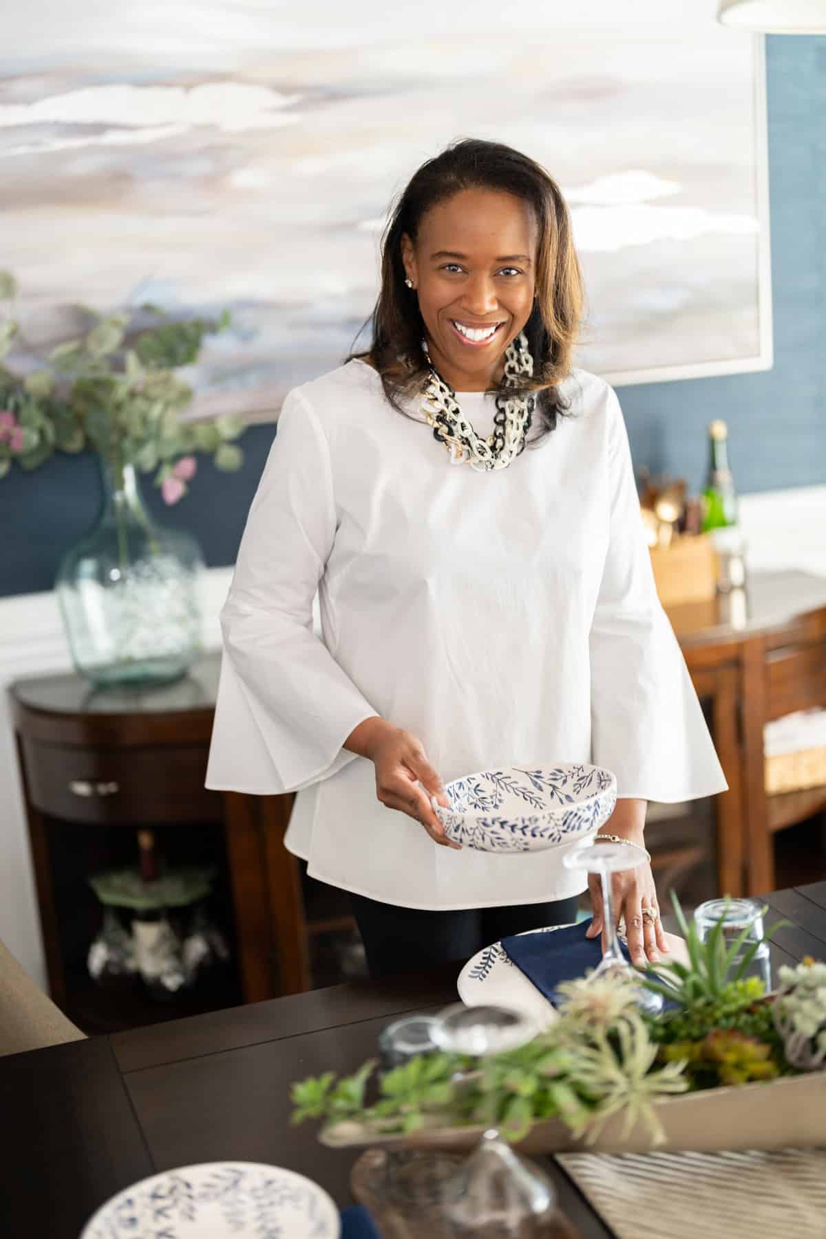 a woman smiling at the camera